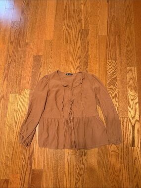 Woven Tie-Front Peplum Blouse in Brown